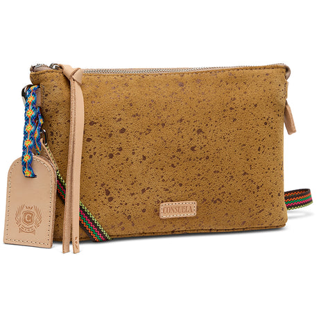 Brown cork handbag with colorful strap and tag on a white background