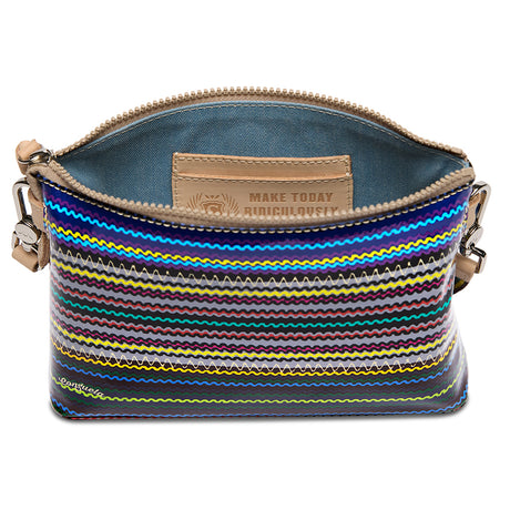 Multicolored striped bag with a visible brand label on a white background