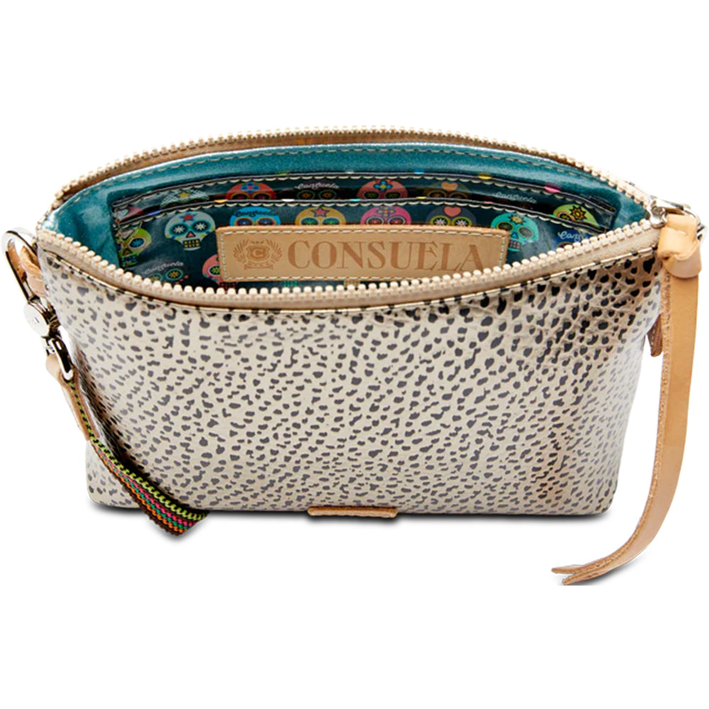 Small handbag with spotted pattern and visible brand name on a white background
