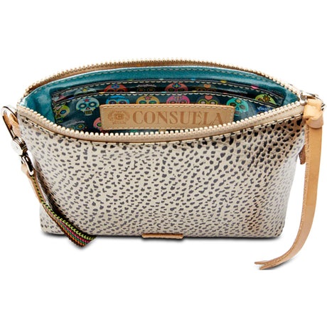 Small handbag with spotted pattern and visible brand name on a white background
