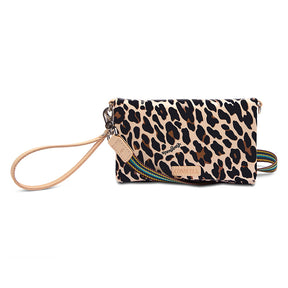A black and white animal patterned leather crossbody bag with a tan strap and a beige zipper.