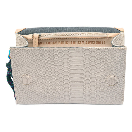 Beige textured pouch with a motivational quote on a white background