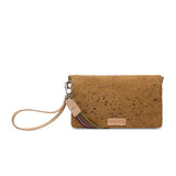 Brown cork clutch with a strap on a white background