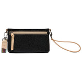 Black wristlet with beige strap and zipper on a white background