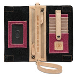 A black textured wallet or organizer with beige faux-leather trim, a wrist strap, card slots, and a magenta glitter ID window and matching card holder. The center zipper pull reads 'MAKE TODAY RIDICULOUSLY AWESOME!'.