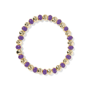 Bracelet with purple and gold beads on a white background