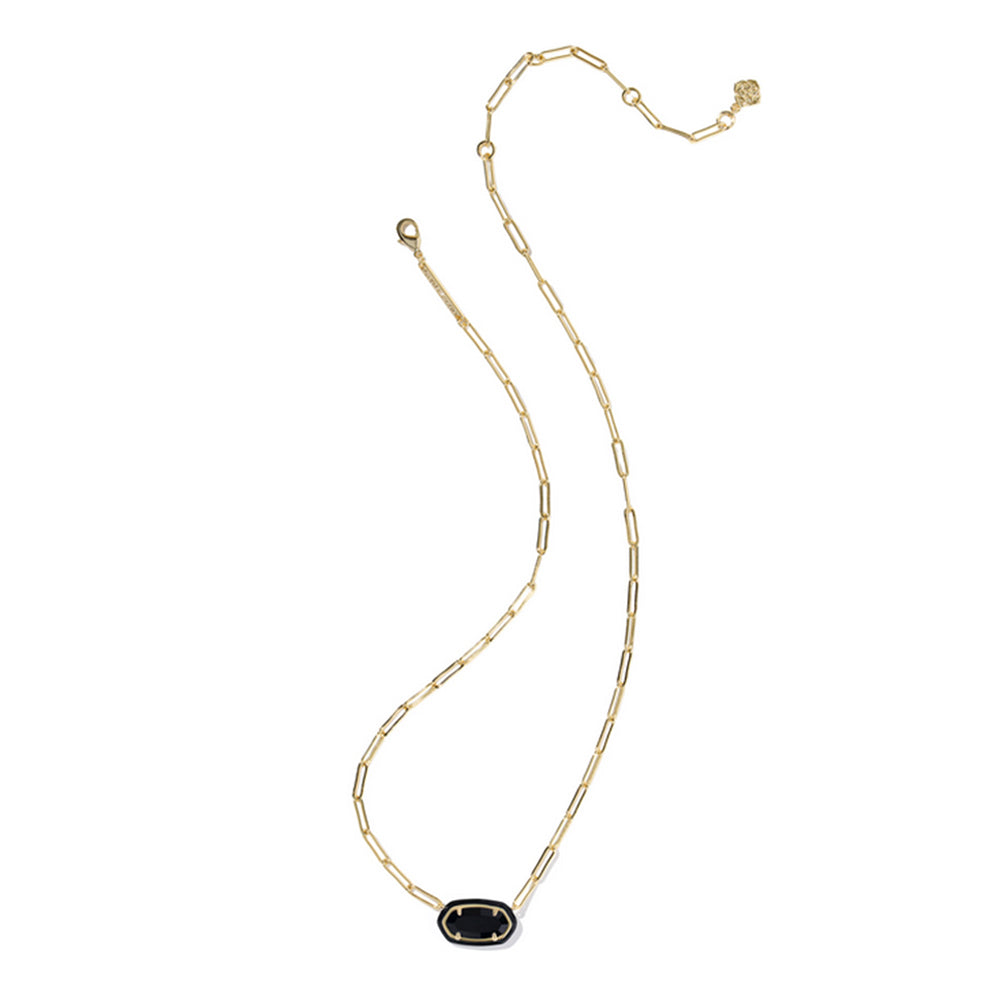 Gold necklace with a black pendant on a white background