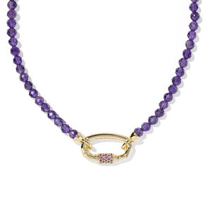 Necklace with purple beads and a gold clasp on a white background