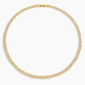 Gold chain necklace on a white background