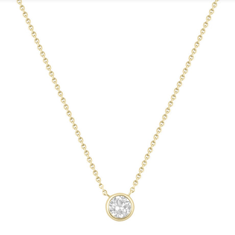 Gold necklace with a round diamond pendant on a white background