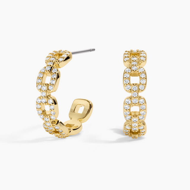 Gold chain hoop earrings with clear gemstones on a white background