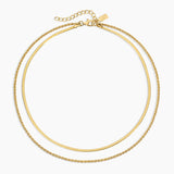 Gold necklace on a white background