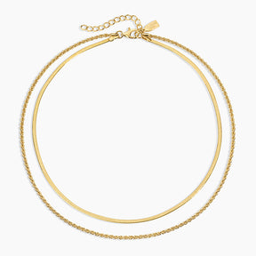 Gold necklace on a white background
