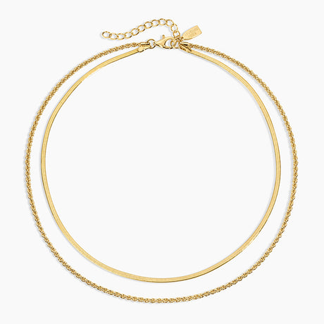 Gold necklace on a white background