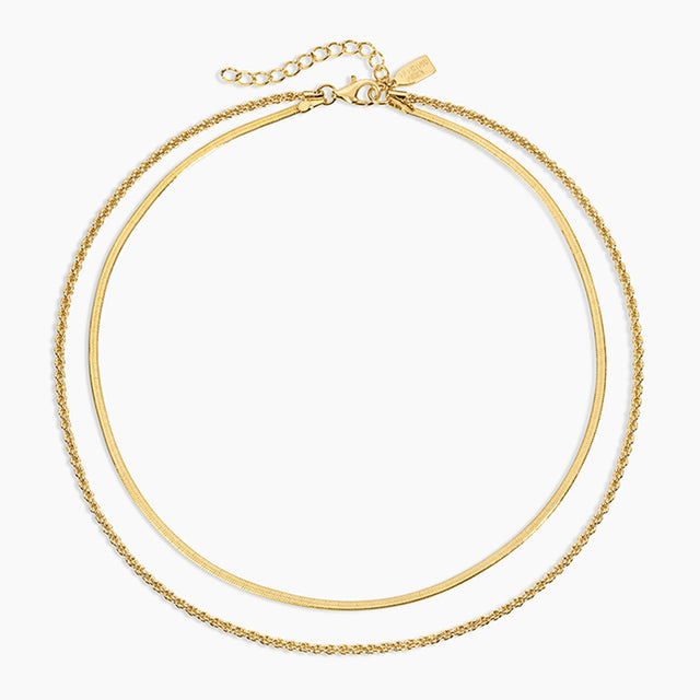 Gold necklace on a white background