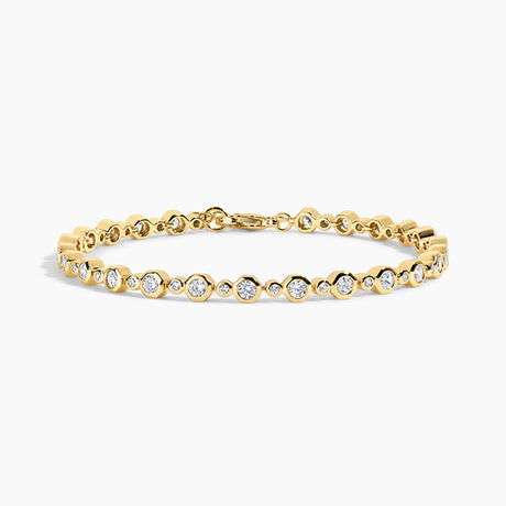 gold bracelet on white background