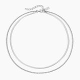 Double chain silver necklace on a white background