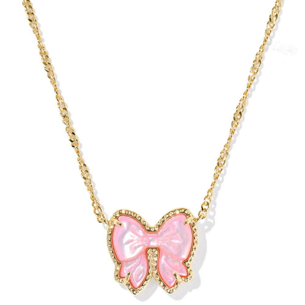 Necklace with a pink bow pendant on a white background