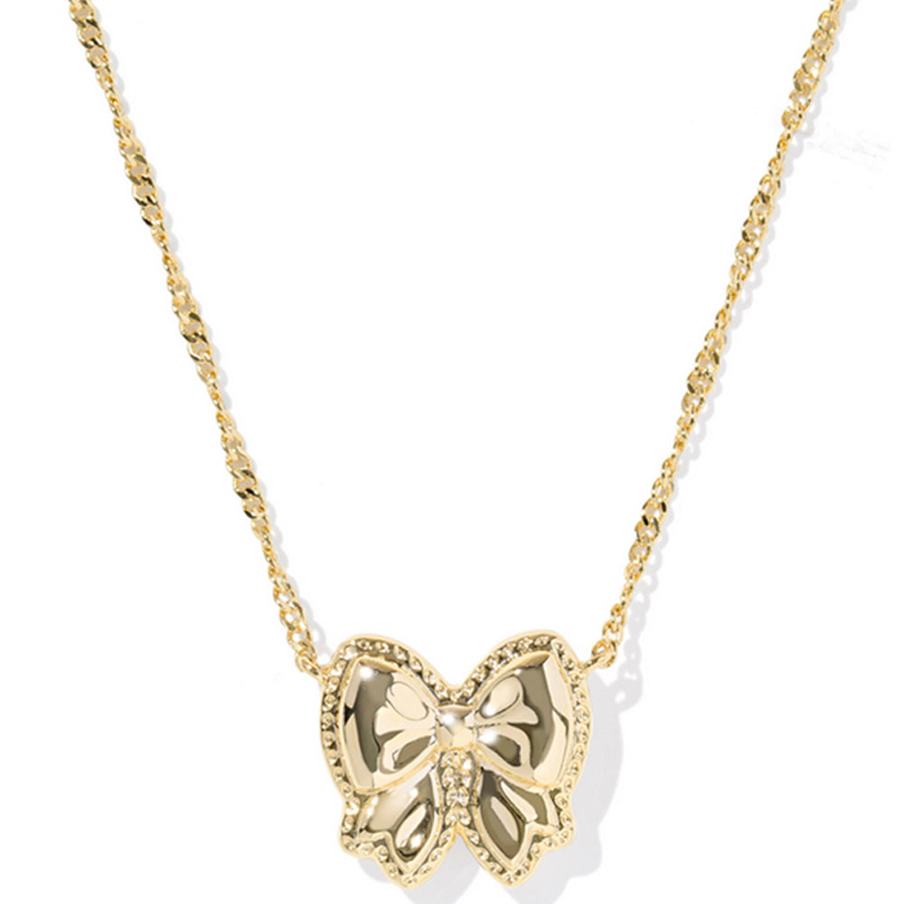 Necklace with a gold bow pendant on a white background