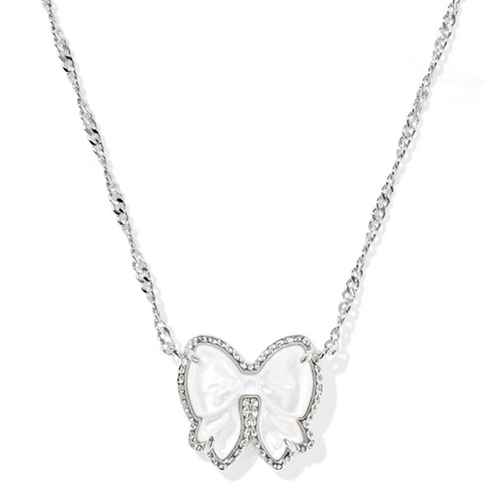 Bow-shaped pendant necklace on a white background