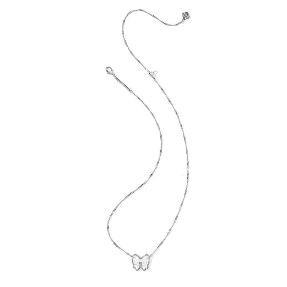 Bow-shaped pendant necklace on a white background