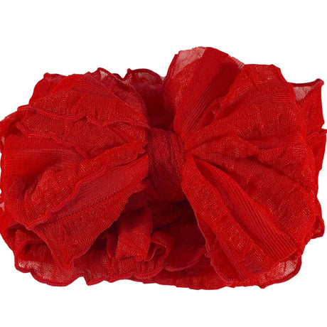 Red bow headband on a white background