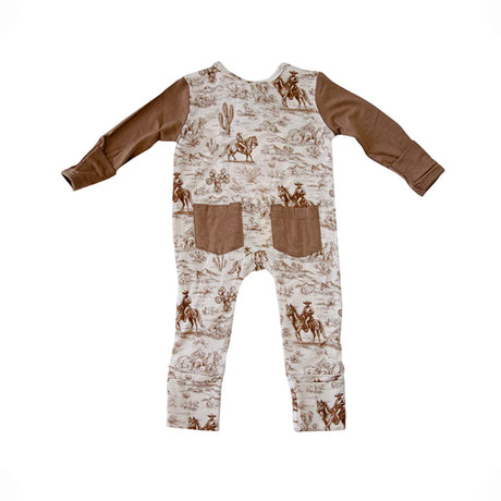 Children's onesie with cowboy print on a white background