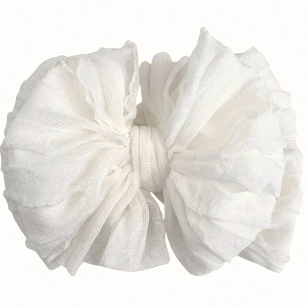 White fabric bow on a white background