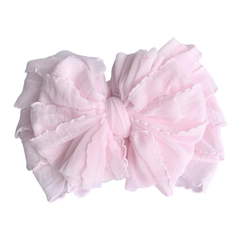 Pink bow on a white background