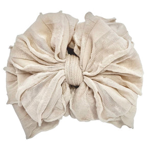 Beige scrunchie on a white background
