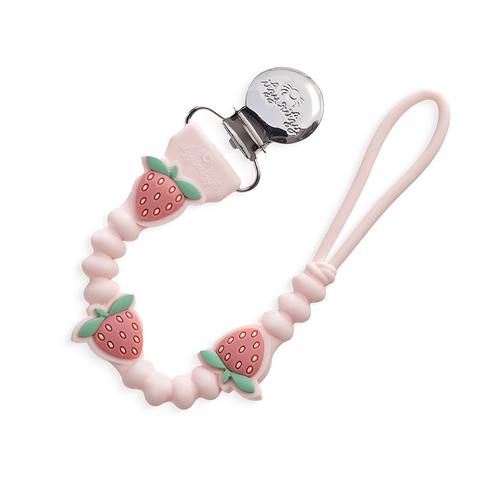 Pink pacifier clip with strawberry design on a white background