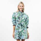 Woman wearing a floral dress on a white background