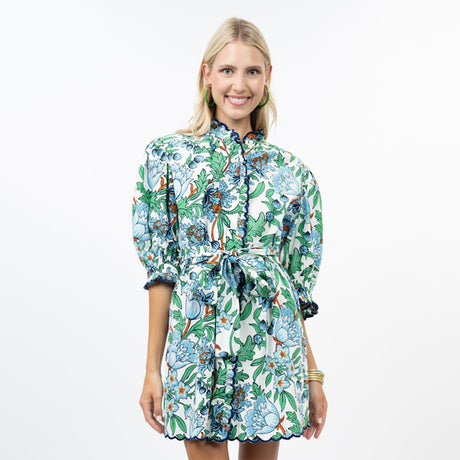 Woman wearing a floral dress on a white background