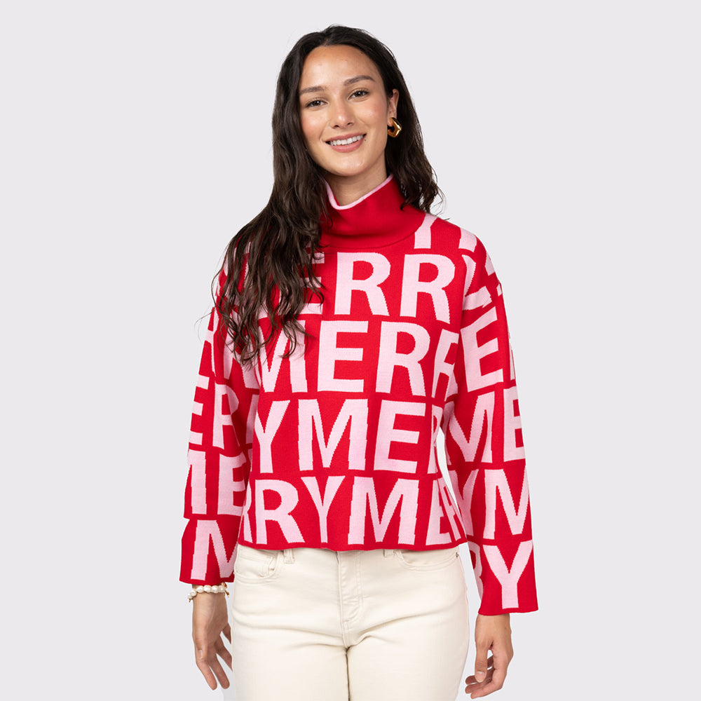 Person wearing a red sweater with 'Merry' pattern on a white background