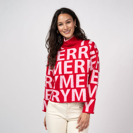 Woman wearing a red sweater with 'Merry' pattern on a white background