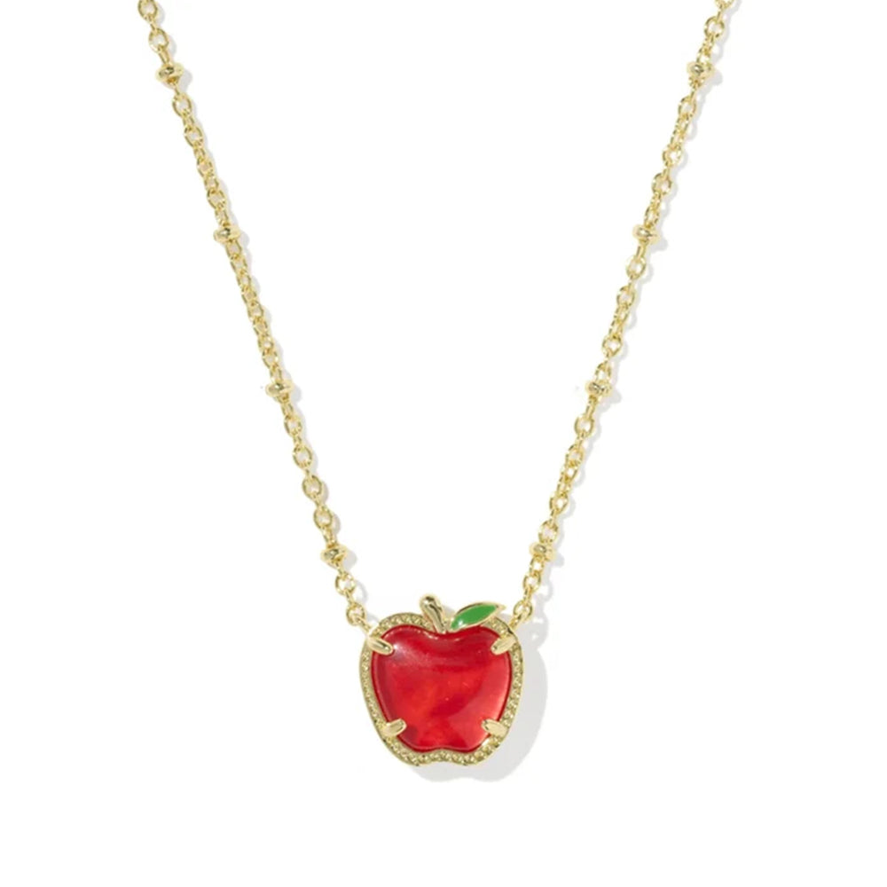 A gold chain necklace featuring a heart-shaped red apple pendant with a gold border and a small green leaf accent, shown on a plain white background.