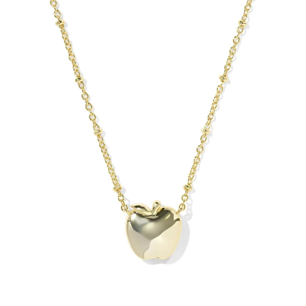 A gold apple pendant necklace on a delicate gold chain, shown against a plain white background.