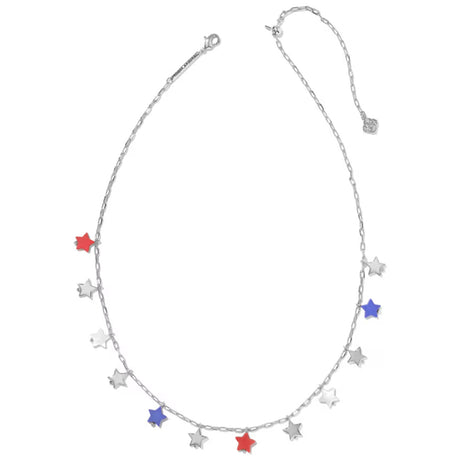 A silver-toned chain necklace with multiple dangling star charms, including three red stars and two blue stars on a plain white background.