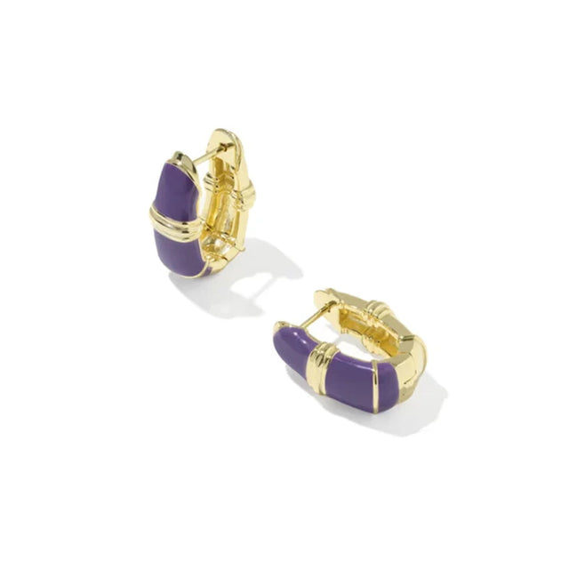 A pair of gold hoop earrings with curved purple enamel inlays, shown on a clean white background.