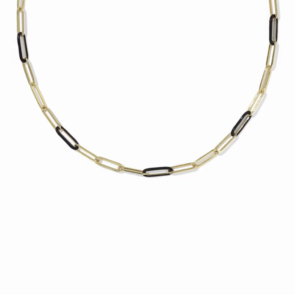 A gold paperclip chain necklace with alternating gold and black links, displayed against a solid white background.