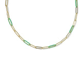 A gold paperclip chain necklace with alternating gold and translucent green paperclip links, shown against a plain white background.
