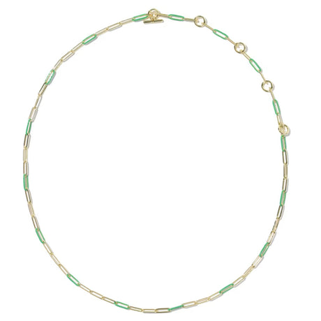 A delicate gold paperclip chain necklace with alternating light green inlay segments, displayed on a clean white background.