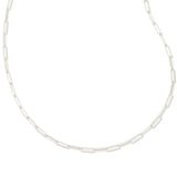 A silver paperclip link chain necklace displayed in a curved shape against a solid white background.