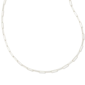A silver paperclip link chain necklace displayed in a curved shape against a solid white background.