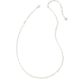 A delicate silver paperclip chain necklace with a lobster clasp and an adjustable extender chain featuring a small heart-shaped charm, displayed on a solid white background.