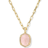 Gold necklace with a pink pendant on a white background