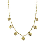 A gold chain necklace featuring multiple small dangling charms, including round medallions and textured floral or skull-like motifs, shown on a plain white background.