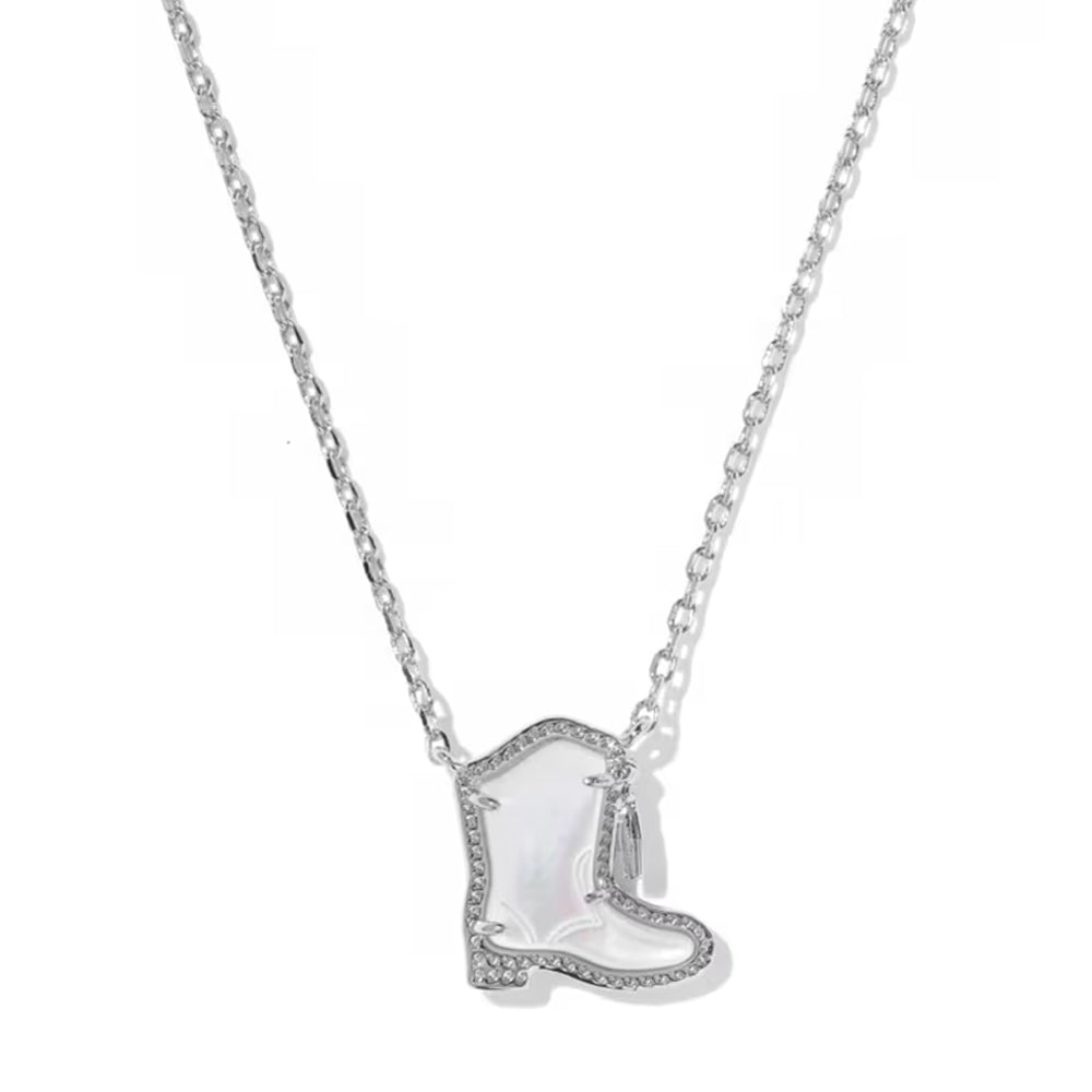 A silver-toned necklace featuring a cowboy boot pendant with a white iridescent inlay and small clear stones along the edges, shown against a plain white background.