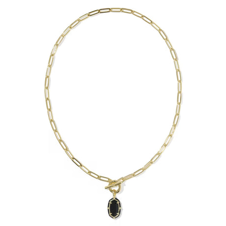 A gold paperclip chain necklace with a toggle clasp and a small oval black gemstone pendant, shown on a plain white background.