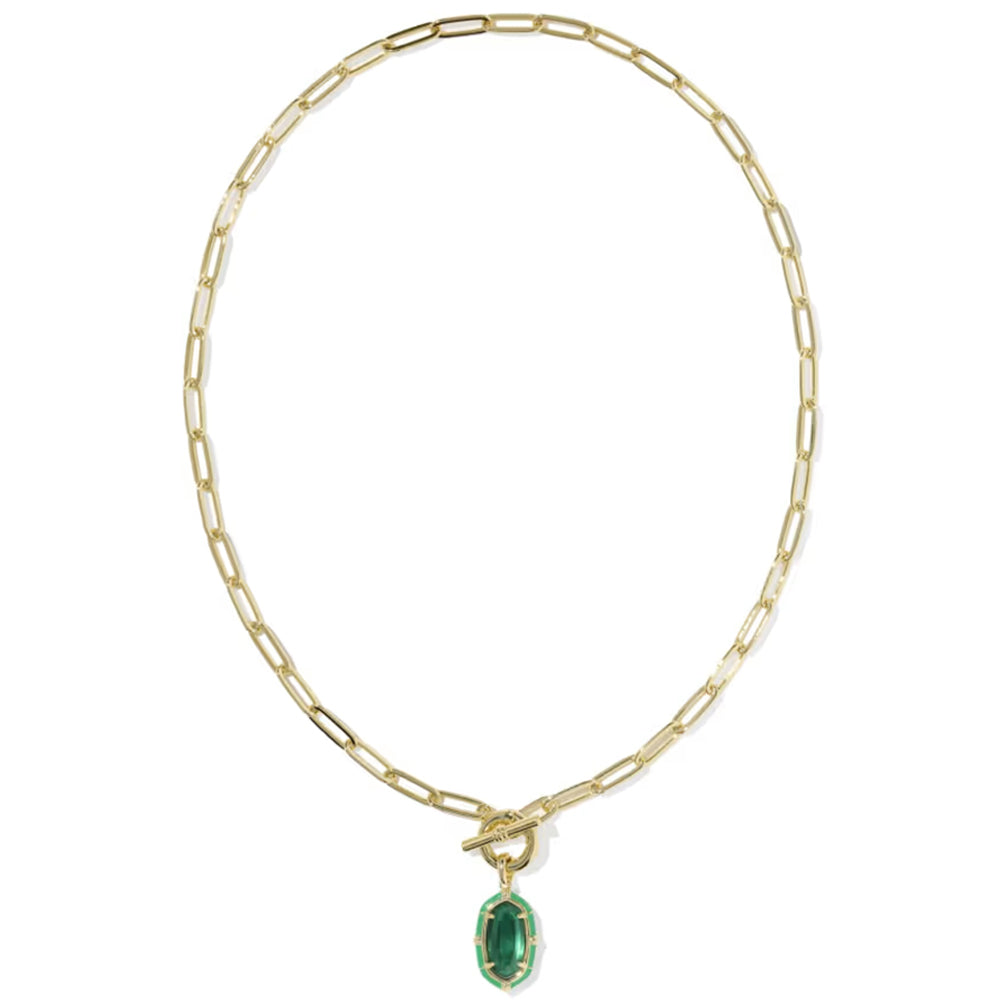 A gold paperclip chain necklace with a toggle clasp and a small oval green gemstone pendant, shown on a plain white background.